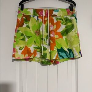 Vibrant Linen Green and Orange Athletic Shorts with Artistic Botanical Design